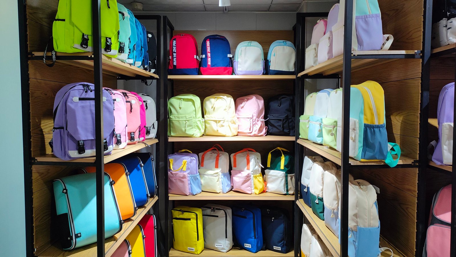 KOV BagFactory showroom - backpack wall